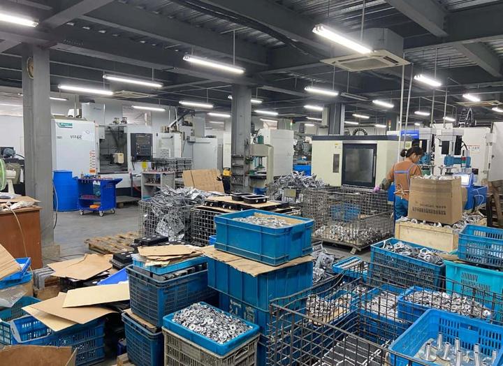 MIM workshop showing precision metal injection molding production floor