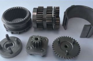 Power tooling components manufactured with precision MIM processes