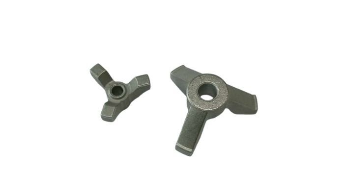 Medical device MIM components showing complex consolidated geometries